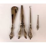 A silver mounted button hook set