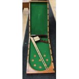 A mahogany cased Riley bagatelle board