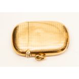 A 9ct gold curved rectangular vesta case, engine turned, maker B&S, Birmingham 1926,