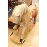 German sit-on horse on wheels