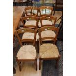 A set of six 19th Century kitchen chairs with rush seats (6)