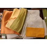 A large collection of table linen and napkins, a tablecloth with broderie anglais trim,