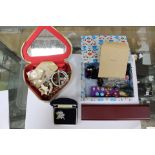 A parcel of mixed costume jewellery to contain a 9ct gold 'Roll of Honor' badge, stone set ring,