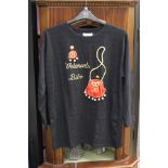 A mid to late 1970's black long sleeved top, embellished with a red satin handbag with a gold rope,