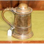 A George III Old Sheffield silver plated lidded tankard, circa 1770, the lid with a domed centre,