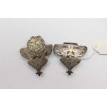 A silver nurses buckle (cherubs)