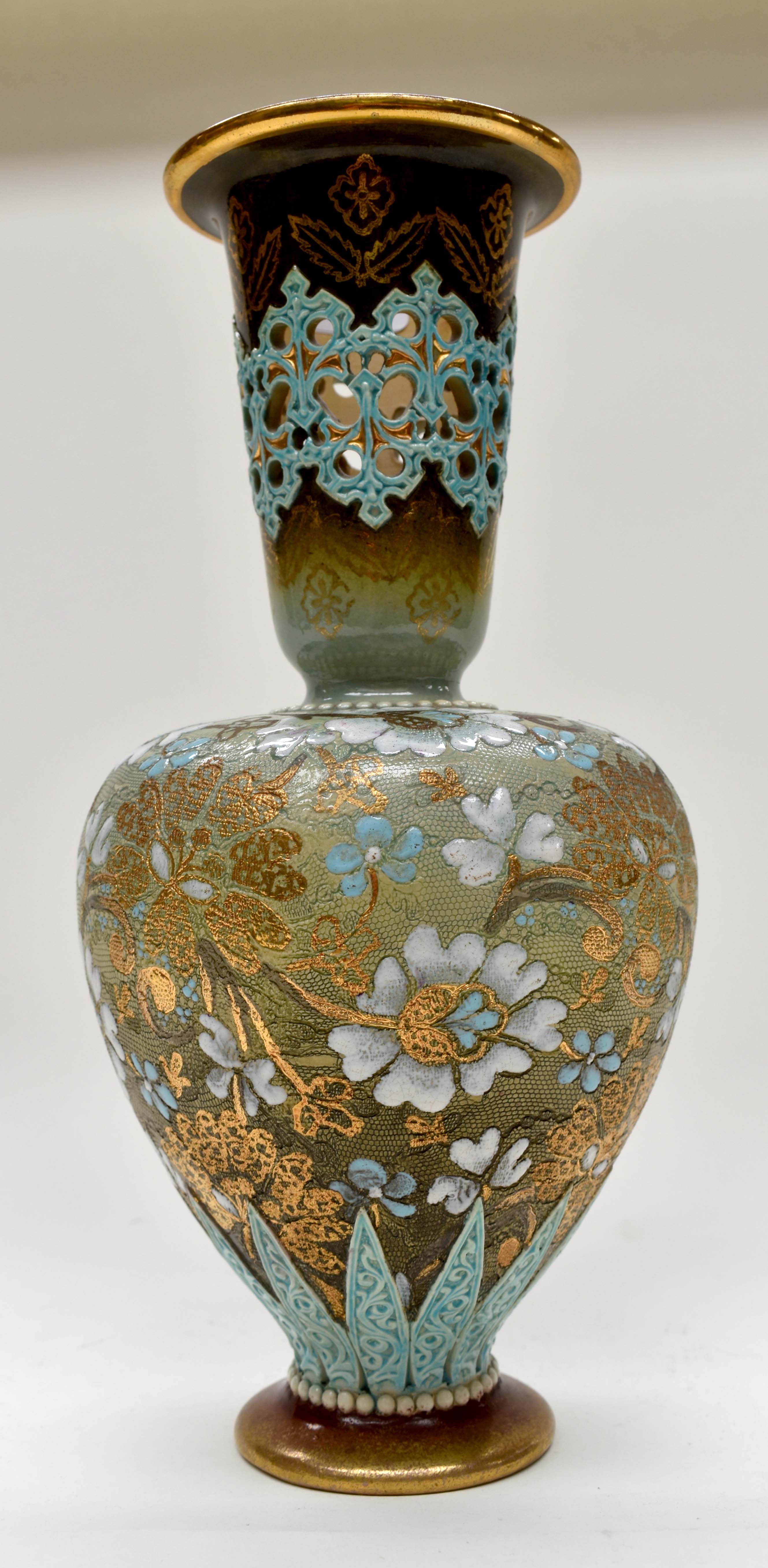 A Royal Doulton Salters Patent vase with reticulated neck