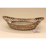 A George V silver pierced basket, oblong form with Art Deco style pierced decoration,