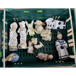 A collection of Snow Babies stamped and further German figurines of Grandma & Grandpa with two