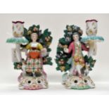 A pair of Samson French Rococo revival figural candlesticks,