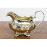 A George IV Sterling silver footed milk jug, London 1826, makers mark for George Burrows,