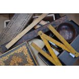 Laquerware, treen money box, rulers, turtleshell backed dressing table set,