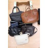A collection of ladies hand bags;