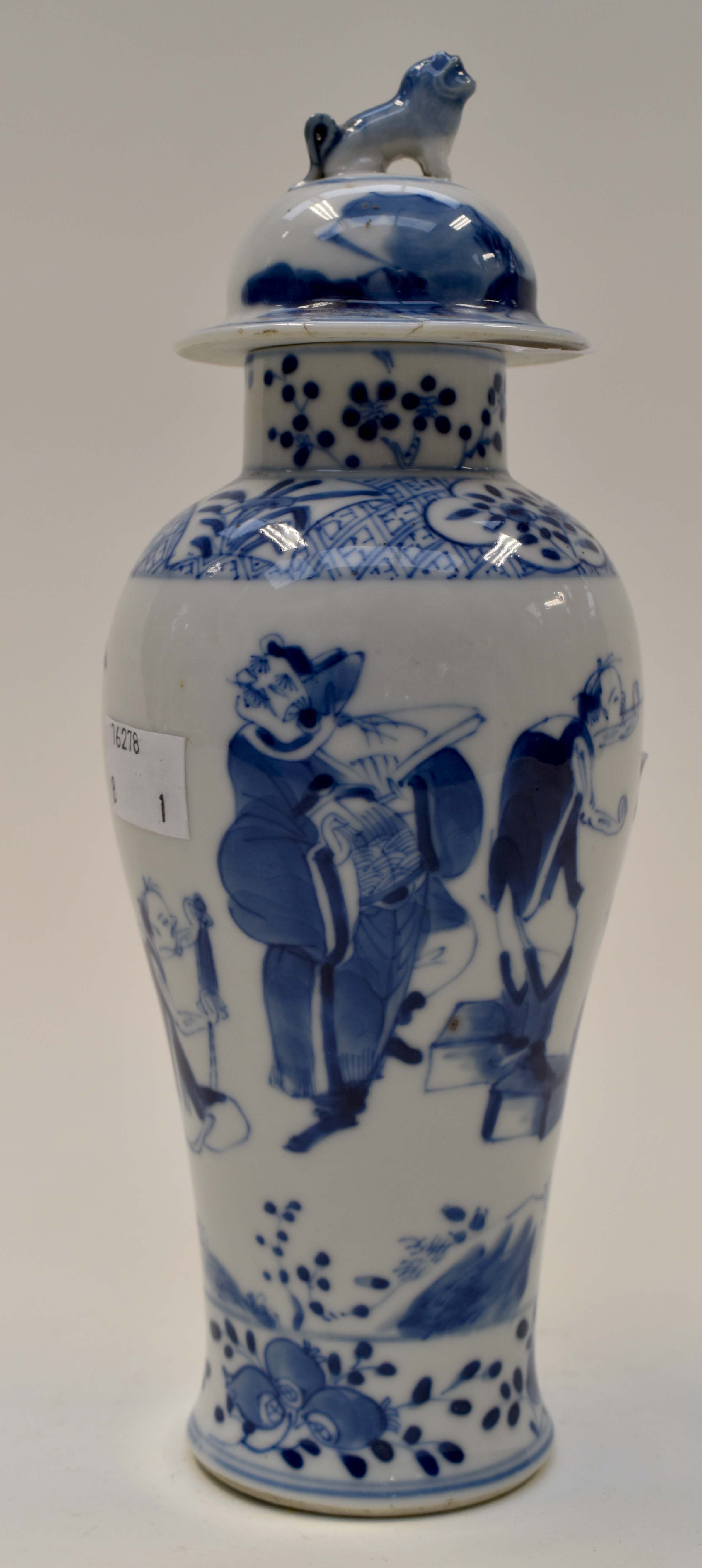 Chinese blue and white vase and cover with dog of foe finial painted with oriental figures and