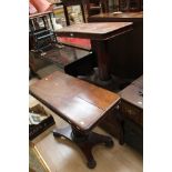A pair of early 19th century mahogany pedestal reading tables,