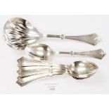 An American Gothic style Sterling silver fruit set including dessert spoons and serving spoon,