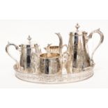 A four piece silver plated tea and coffee service, comprising teapot, coffee pot,