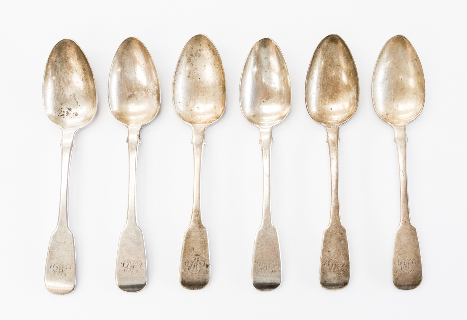 A set of six Victorian provincial fiddle pattern dessert spoons,