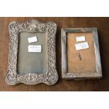 Two silver photograph frames,