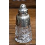 An Edwardian cut glass silver topped sugar shaker, London 1909,