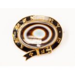 A Victorian enamel and banded agate brooch, in the form of a buckle,