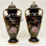 A pair of Alton Ware two handled pottery vases and covers