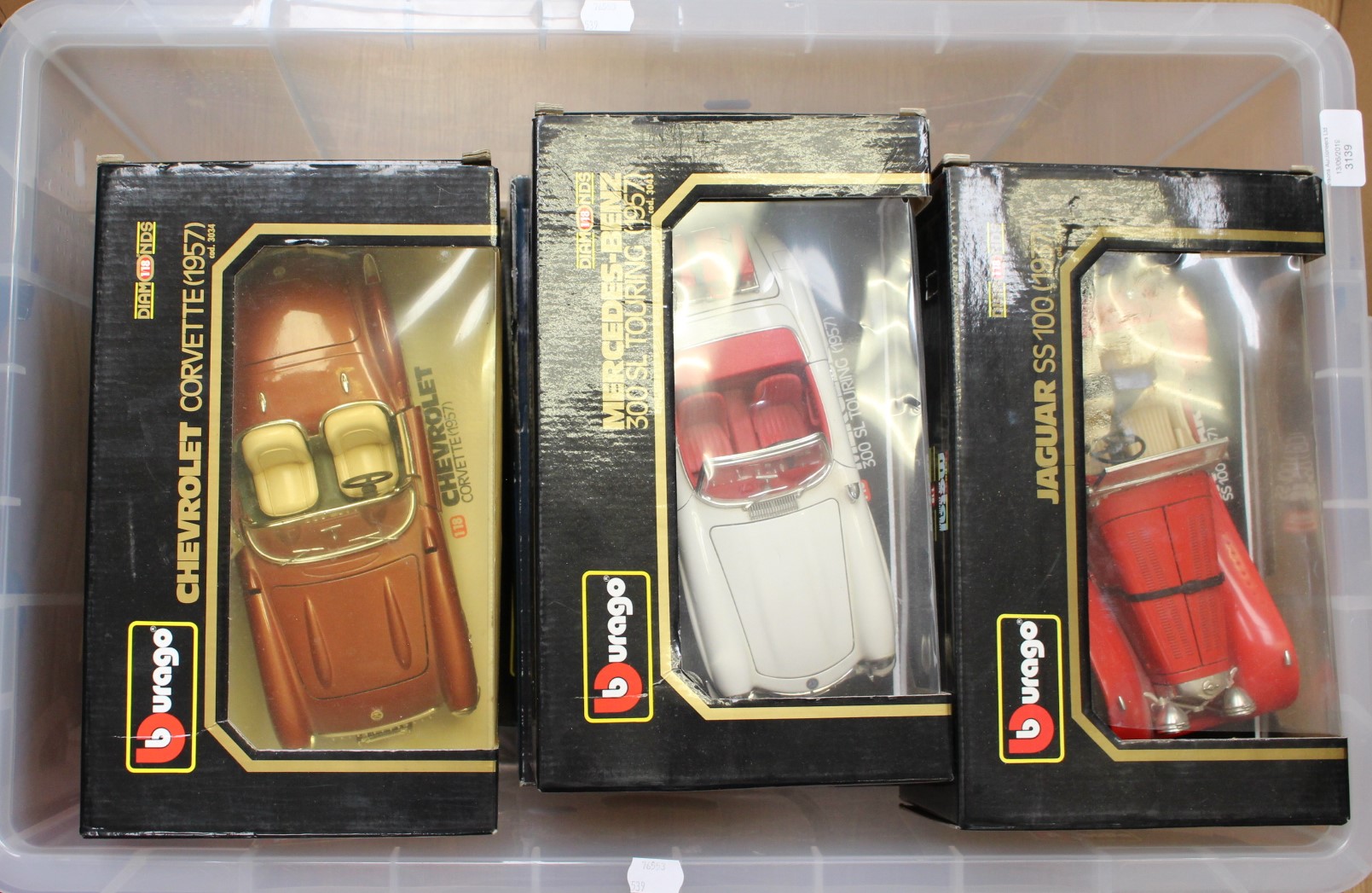 9 x 1:18 scale cars including Burago, Solido, Revell,