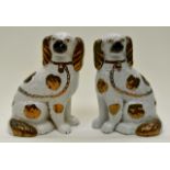 A pair of Staffordshire spaniels,