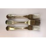 A matched set of six George III and later silver table forks,