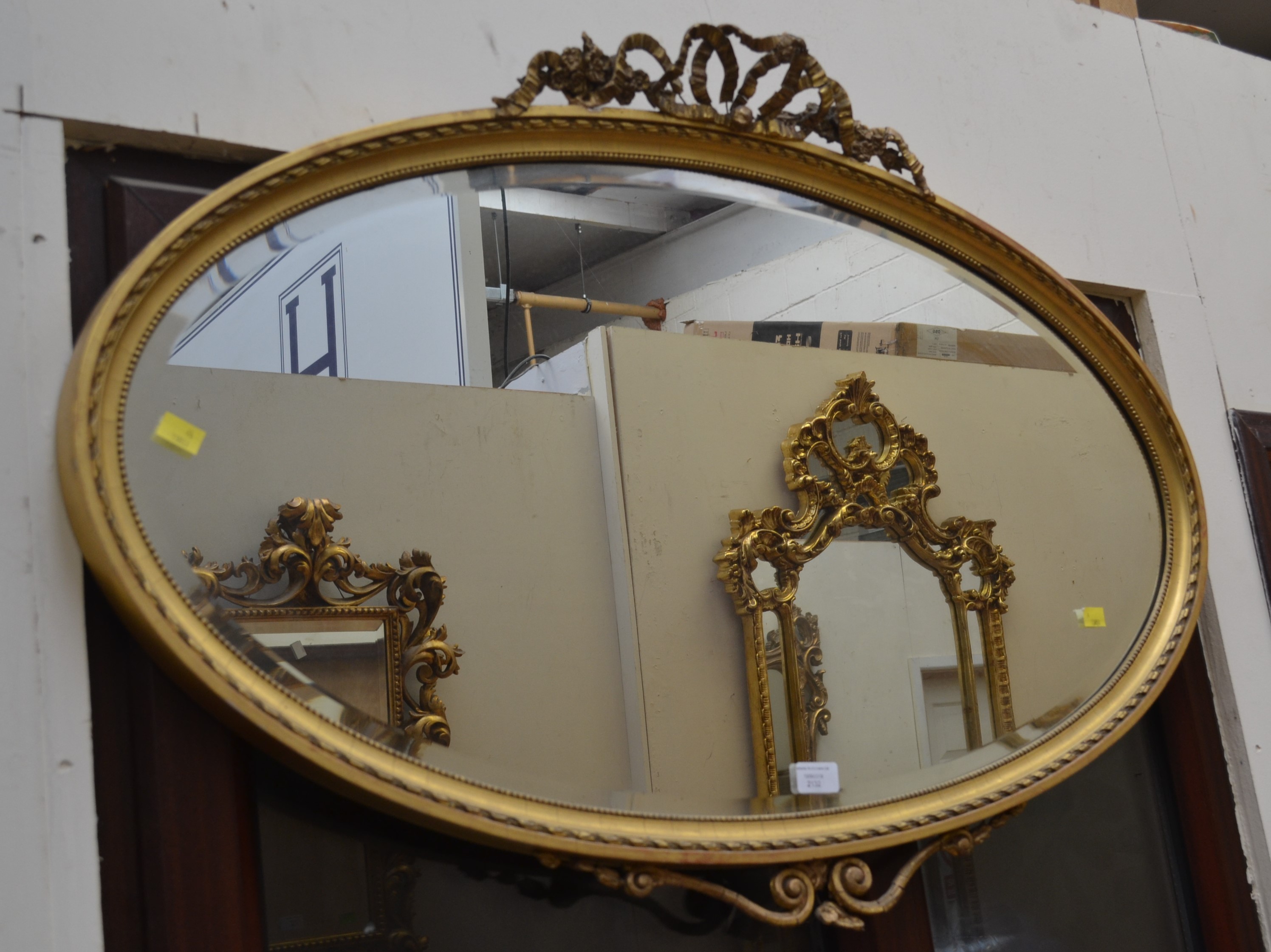 Victorian oval gilt framed mirror