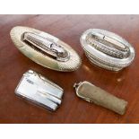 Three silver plated cigarette lighters,