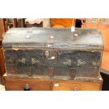 An 18th century domed trunk with original case.