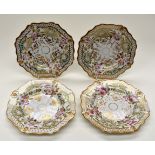Four English porcelain painted dishes, Dog Rose, some rubbing of gilt,