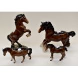 Beswick; a bay shire horse, a bay rearing horse on plinth,