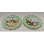 Royal Crown Derby, a pair of scene painted plates by W.E.J.