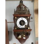 A 20th century wall clock, with two weights,