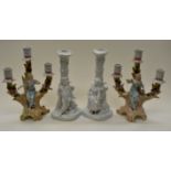 Two pairs of ceramic candlesticks,
