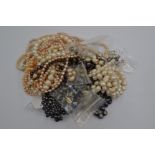 A quantity of freshwater cultured pearl necklace to include coloured examples and imitation