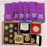 A Royal Mint proof coin set, dated 1989, in red leather case, four various commemorative crowns,