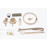 A collection of silver jewellery to include a marcasite set brooch, silver ingot,