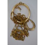 A 9ct yellow gold engraved bracelet, various 9ct gold chain necklaces, five bracelets,