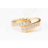 An 18ct gold Maltese and diamond set ladies dress ring, ring size 'N' 3.
