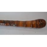 A Japanese carved treen walking cane,