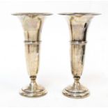 A pair of George V silver trumpet shaped vases, Barker Brothers, Chester,