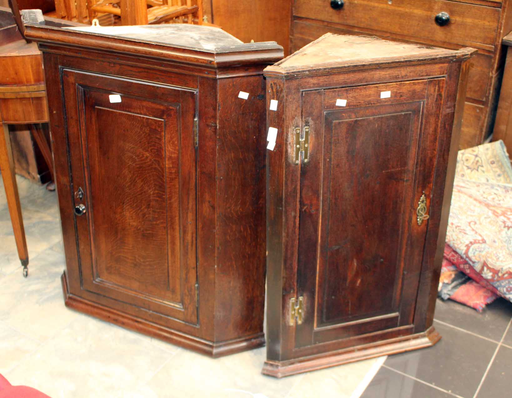 Two corner cupboards