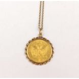 Austrian Ducat dated 1915 within a yellow gold mount on a unmarked yellow metal chain