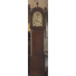 A George III oak cased longcase clock, circa 1800, eight day movement, the hood with an arched door,