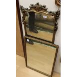 A pair of gilt framed mirrors