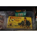 Raiders of the Lost Ark game, sealed and as new; Trust Me game, sealed; Option game,