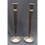 Pair of bronzed candlesticks